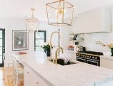 While they couldn’t save the home’s original brass hardware, it inspired the new kitchen’s hardware. As for the ceiling fixtures, they went big. “With lighting, nothing is more important than scale. Tiny pendants over a kitchen island kill me, ” says Gen.